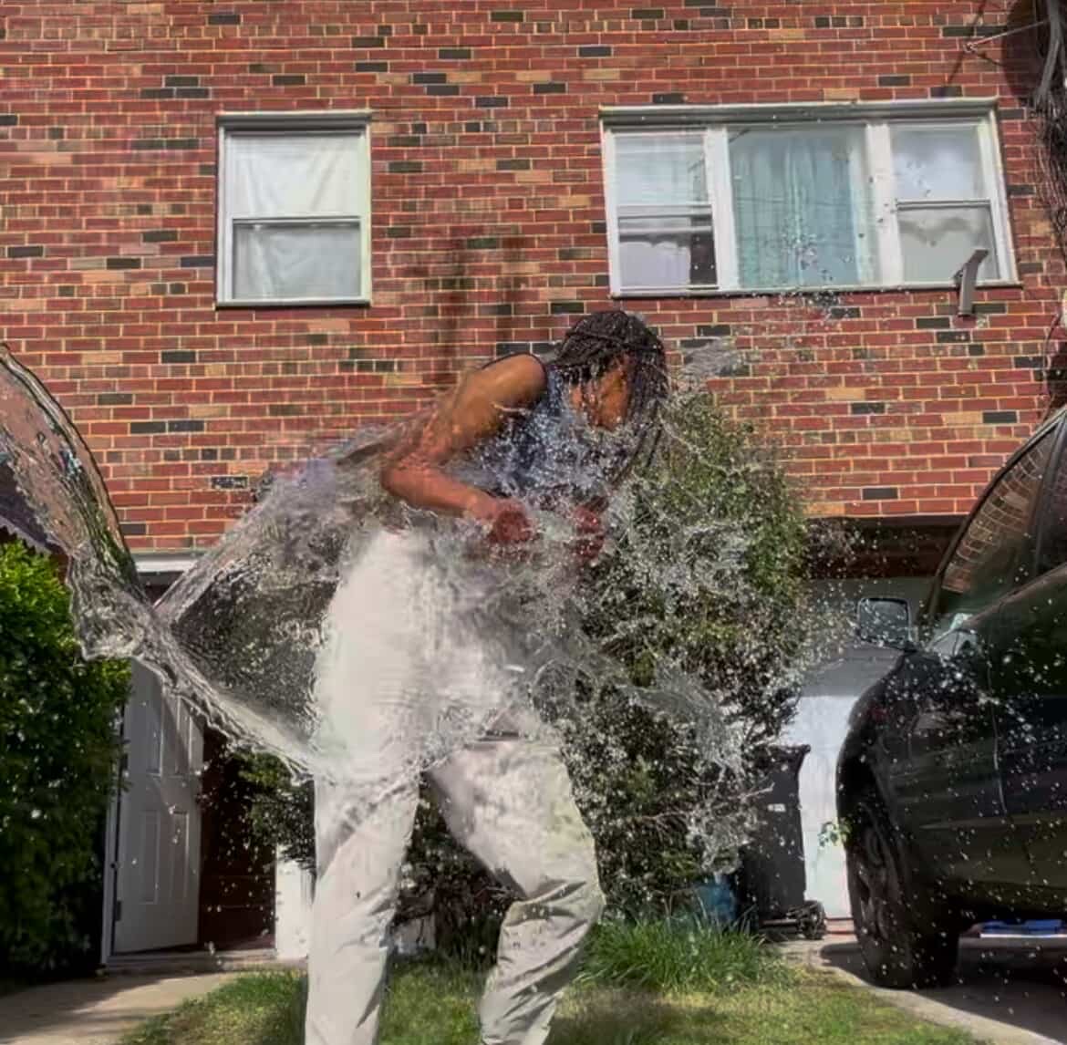 Vidonia Thompson gets splashed to support mental health awareness.